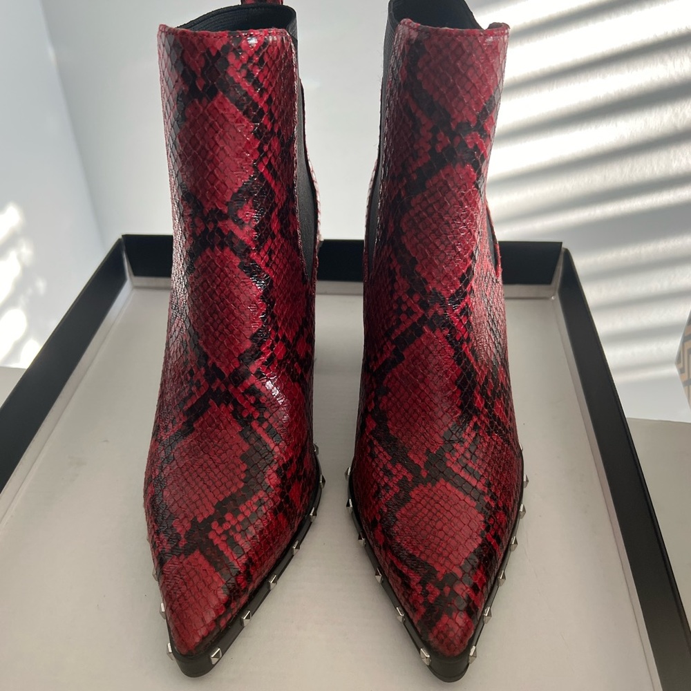 Adorable Charles David red and black snakeskin booties.